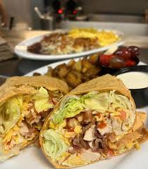 The Delectable Egg signature dishes Breakfast Burrito
Two Cage Free Eggs with Choice of Meat
Huevos Rancheros